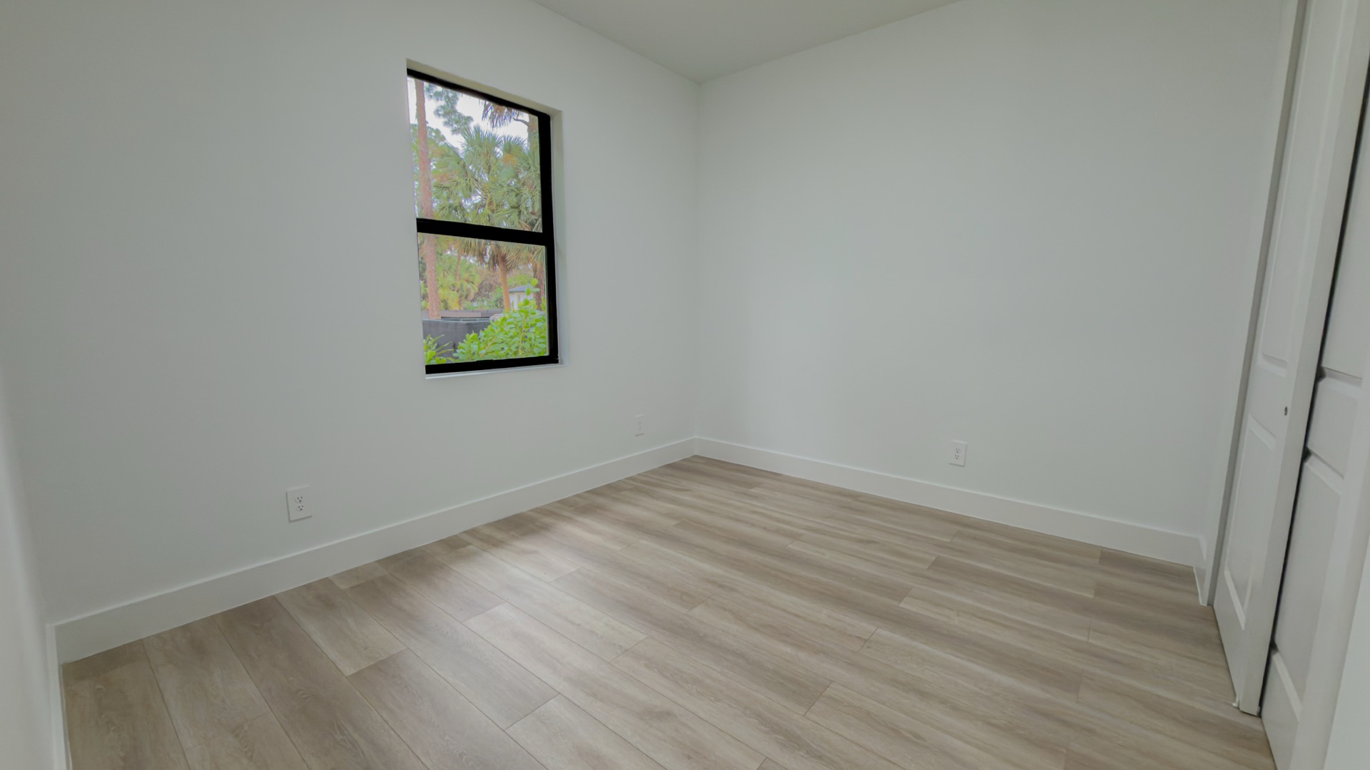 Bedroom with palms